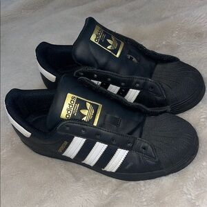 Adidas Superstar Black Sneakers with Gold and White Details